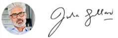 An image of a man with glasses and a signature.